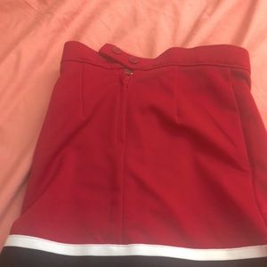 Hi I’m a 8 year old trying to sell things,this is a kids skirt red black